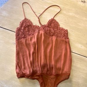 Free people lace onesie . XS